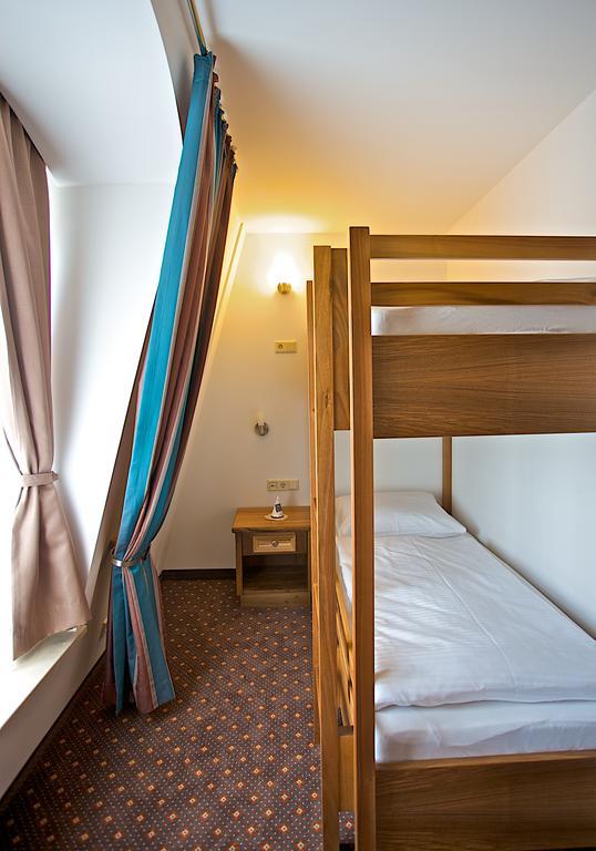 Hotel Am Schlossberg Έρντινγκ Δωμάτιο φωτογραφία